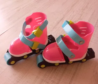 Patines infantiles rosas con ruedas.