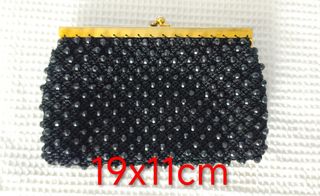 Bolso de mano vintage con pedrería.