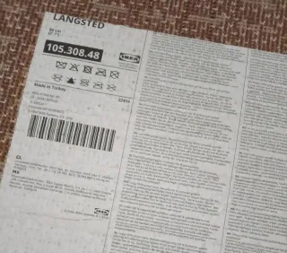 Alfombra redonda Ikea marrón y beige 80x80