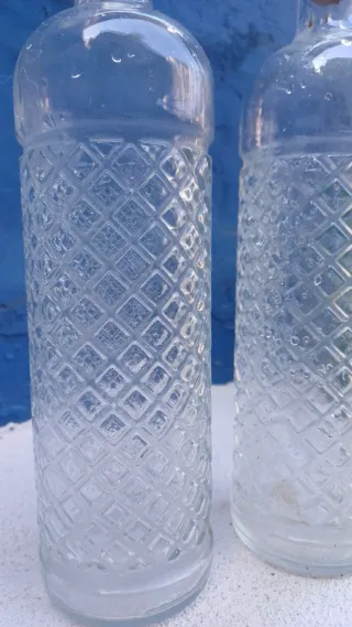 Coppia di bottiglie in vetro 31cm