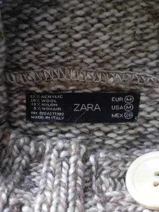 Jersey Zara jaspeado cuello alto botones