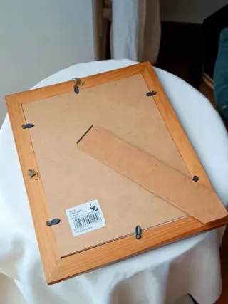 Quadro con cornice in legno