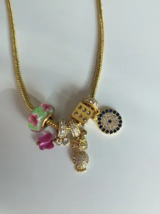 Conjunto collar y pulsera oro y rosa