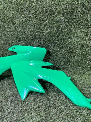 Plásticos laterales mini cross verdes