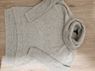 Jersey cuello vuelto beige y gris