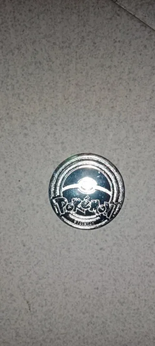 Moneda Mega Charizard X
