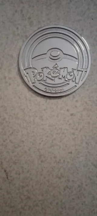 Moneda Mega Charizard X