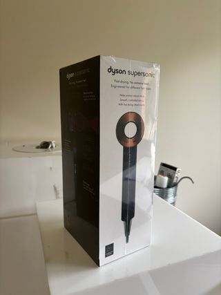 Secador Dyson Supersonic Azul y Dorado