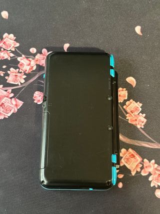 Nintendo 2DS XL Negra y Azul + Extras