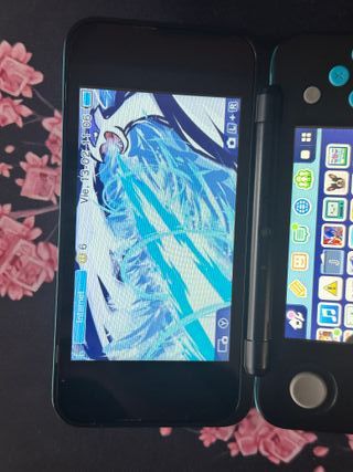 Nintendo 2DS XL Negra y Azul + Extras