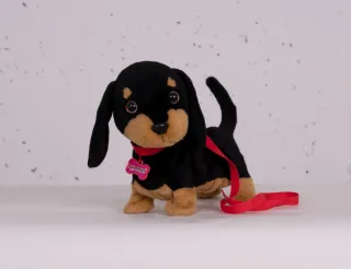 Perro peluche andarin con correa.