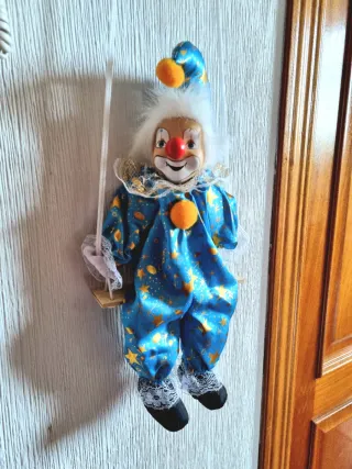 Payaso de Porcelana con columpio