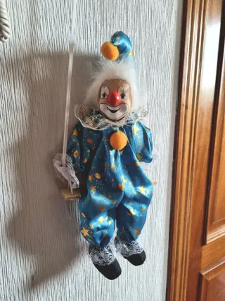 Payaso de Porcelana con columpio