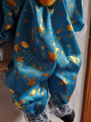 Payaso de Porcelana con columpio