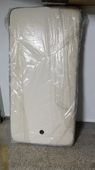 Somier canguro de láminas y colchones.