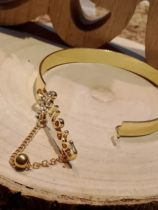 Brazalete Guess Dorado con Cadena y Perla