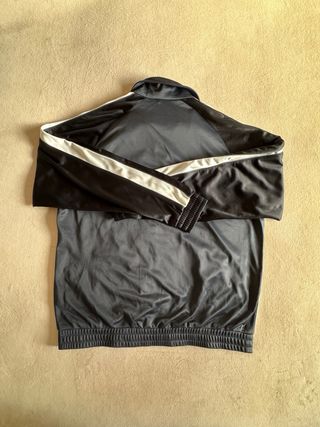 Chaqueta deportiva Lotto negra y blanca