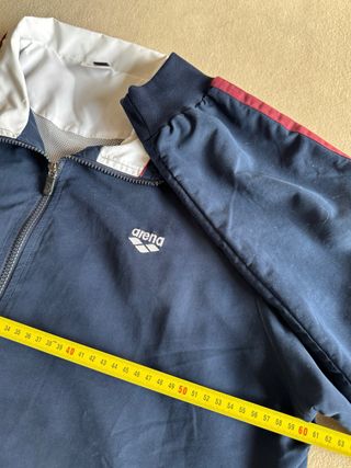 Chaqueta deportiva Arena azul y blanca