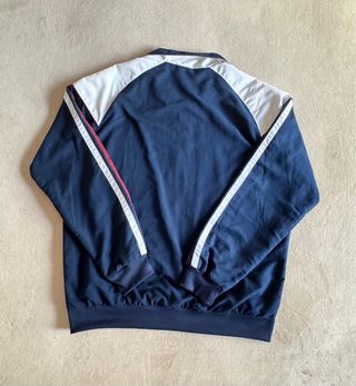 Chaqueta deportiva Arena azul y blanca