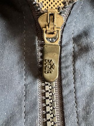 Chaqueta deportiva Arena azul y blanca