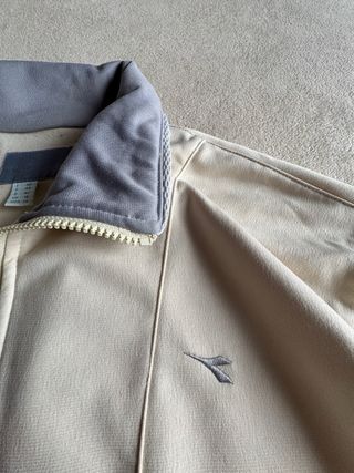 Chaqueta Diadora Beige y Gris
