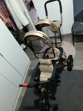 Bicicleta gemelar para dos niños