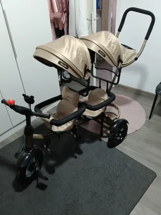 Bicicleta gemelar para dos niños