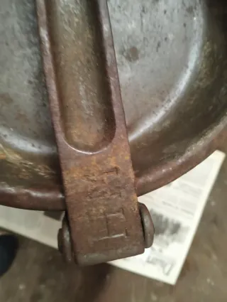 Lechera antigua de metal