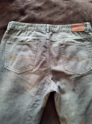 Pantalones vaqueros hombre gris