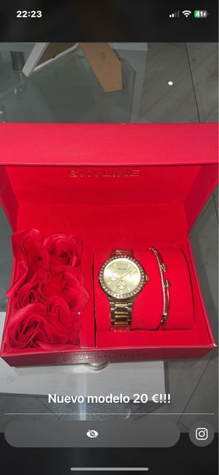 Reloj y pulsera dorados SKYLINE