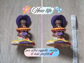 Bambola in ceramica fatta a mano