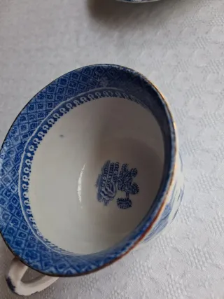 Taza y plato de porcelana azul