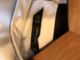 Top Zara blanco cuello joya