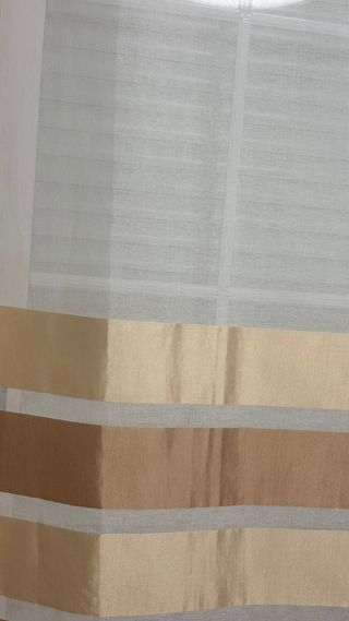 Cortinas salón beige y oro
