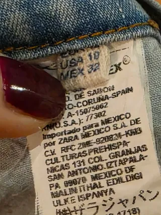 Jeans flare con applicazioni luccicanti