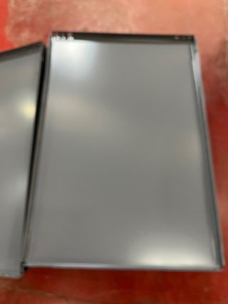 Bandeja desmontada y patas Estantería