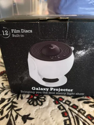 Proyector Galáctico con 12 Discos de Película