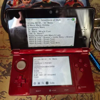Nintendo 3DS Roja con muchos juegos y funda