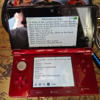 Nintendo 3DS Roja con muchos juegos y funda