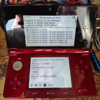 Nintendo 3DS Roja con muchos juegos y funda