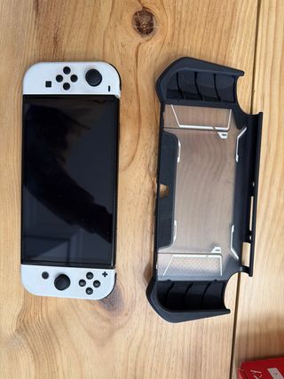 Nintendo Switch OLED Blanca + 4 juegos