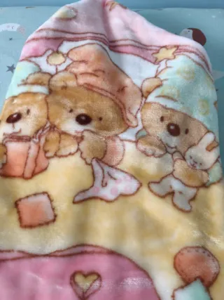 Capa de bebé rosa con estrellas