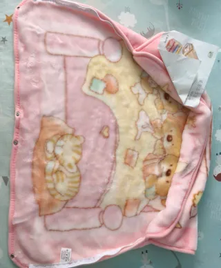 Capa de bebé rosa con estrellas