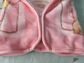 Capa de bebé rosa con estrellas