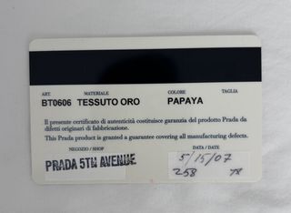 Bolso Prada color Papaya con cadena Dorado