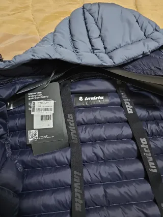 Piumino blu con cappuccio