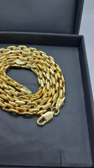 Cadena trenzada trigo chapada oro 750