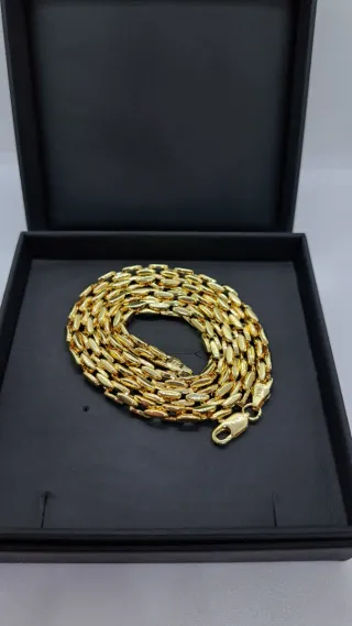 Cadena trenzada trigo chapada oro 750