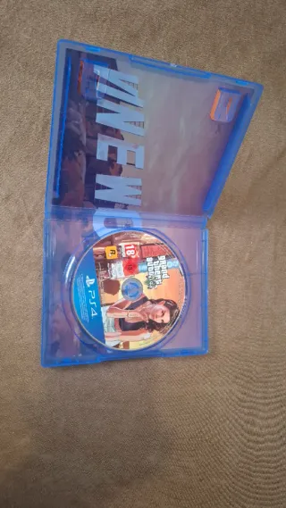 PS4 Slim 1TB + 5 Juegos TOP + Base Carga + Mando