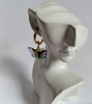 Pendientes mariposa acero dorado